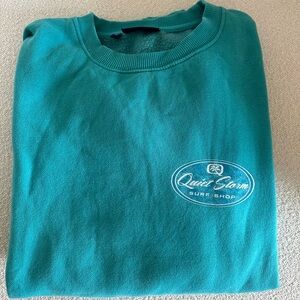 Teal woman’s crewneck
